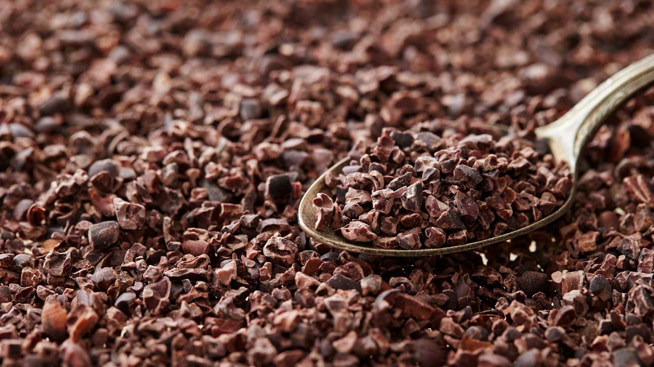 Raw organic dark cacao nibs and whole dried cacao pods rich in cardiovascular-supporting flavanols and epicatechin antioxidants.